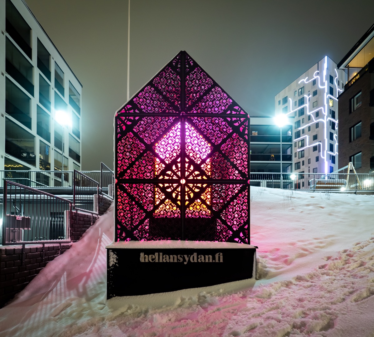 Hellan Sydän glowing in a snowy winter landscape at night