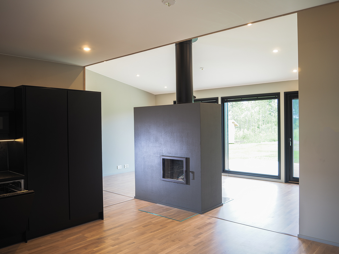 Completed living room and central fireplace